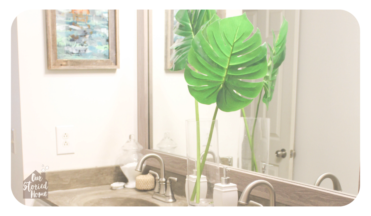 bathroom-with-frame-around-mirror